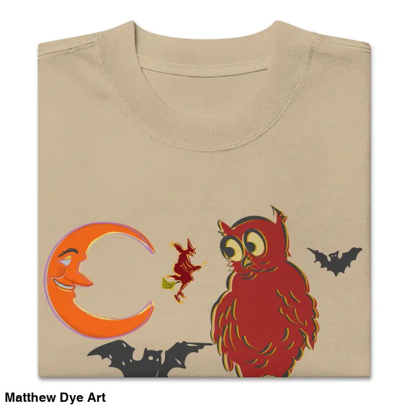 Folded beige oversized faded t-shirt featuring Witching Hour Watcher Halloween design