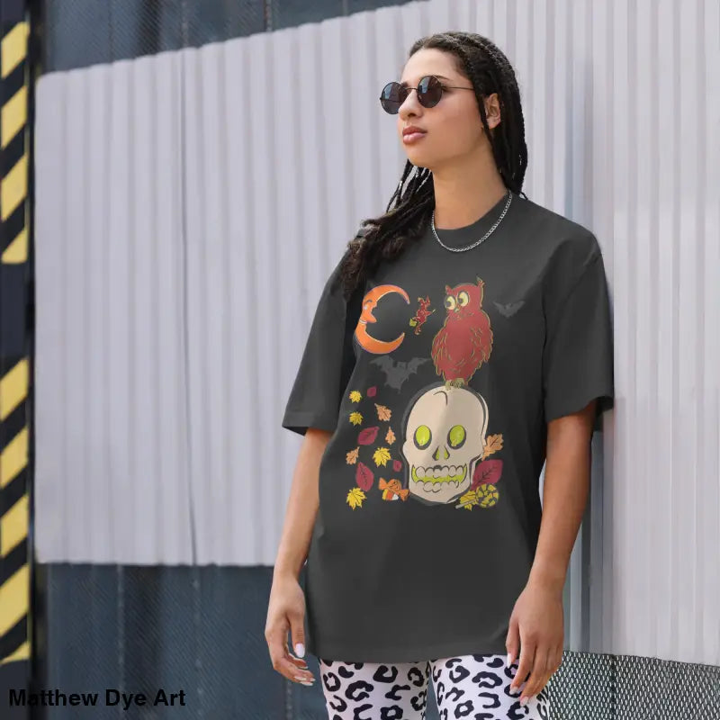 Oversized faded t-shirt featuring a Halloween theme for a stylish haunted harvest look