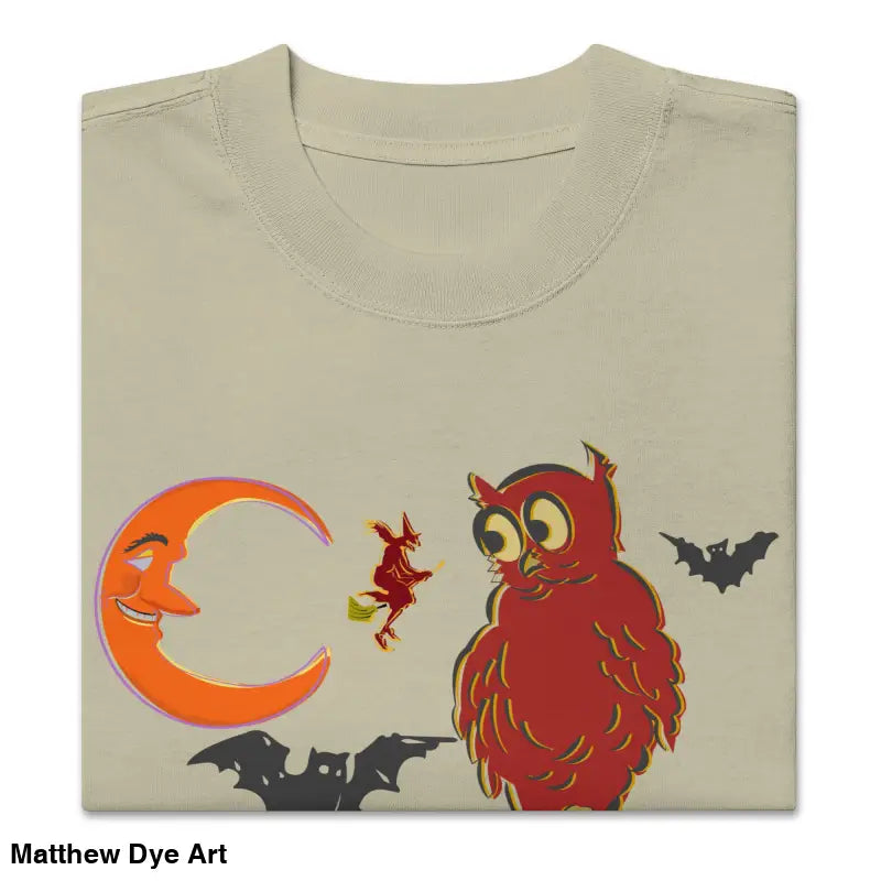 Folded oversized faded t-shirt featuring Witching Hour Watcher design for haunted harvest