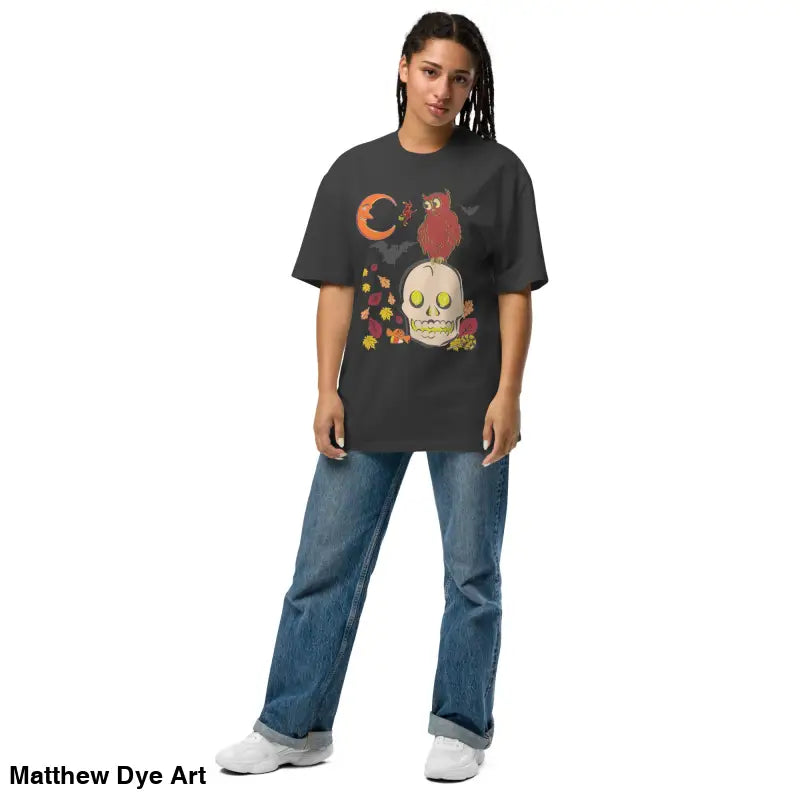 Oversized faded t-shirt featuring Halloween graphic for a stylish haunted harvest look