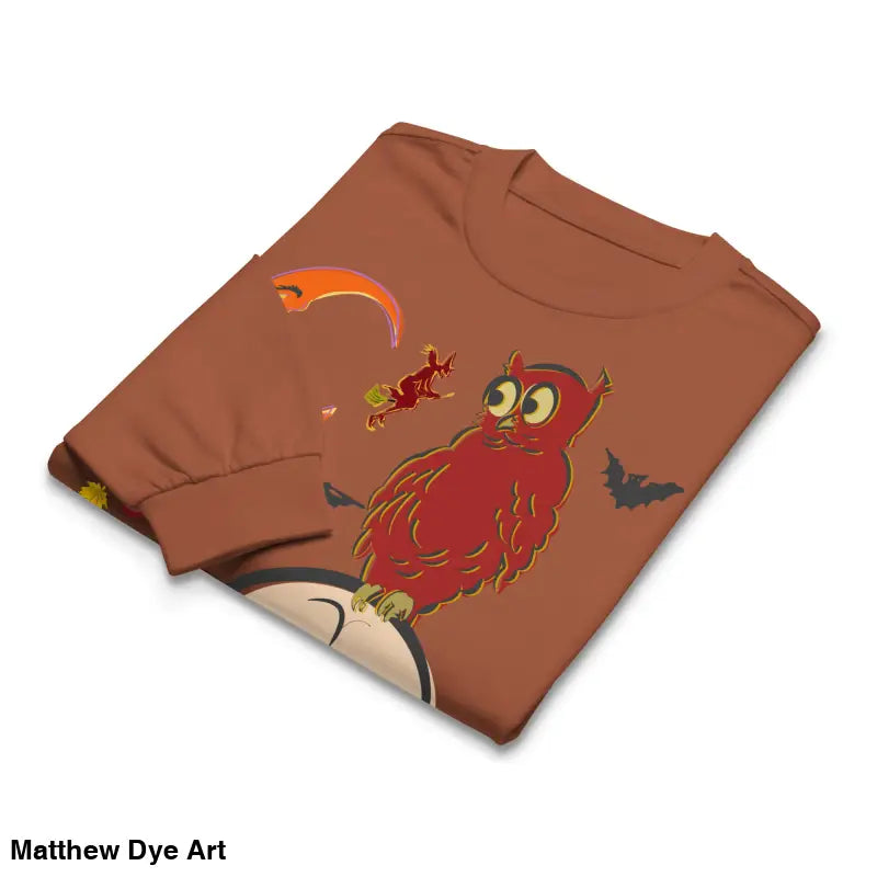 Folded brown long-sleeved shirt featuring Halloween graphics of an owl and skull