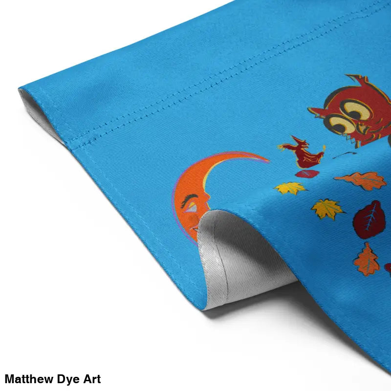 Blue fabric Halloween garden flag featuring cartoon moon, owl, and leaves for festive spirit