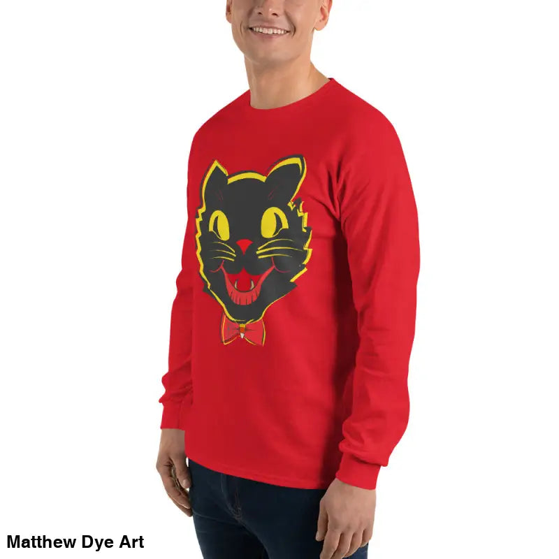 Red long sleeve shirt featuring black cat graphic from Witch’s Familiar vintage cat unisex collection