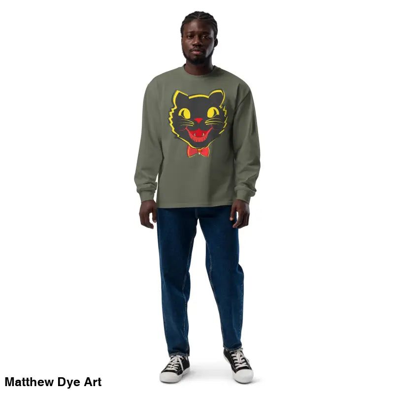 Man models a vintage cat premium heavyweight long sleeve sweatshirt for Halloween