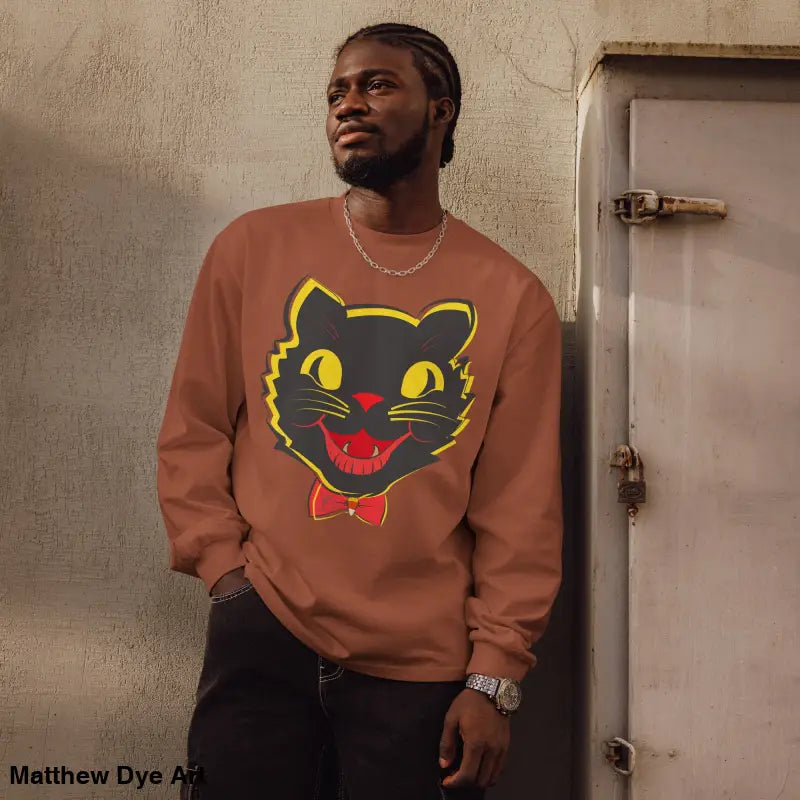 Man showcasing a Vintage Halloween Cat Premium Heavyweight Long Sleeve shirt