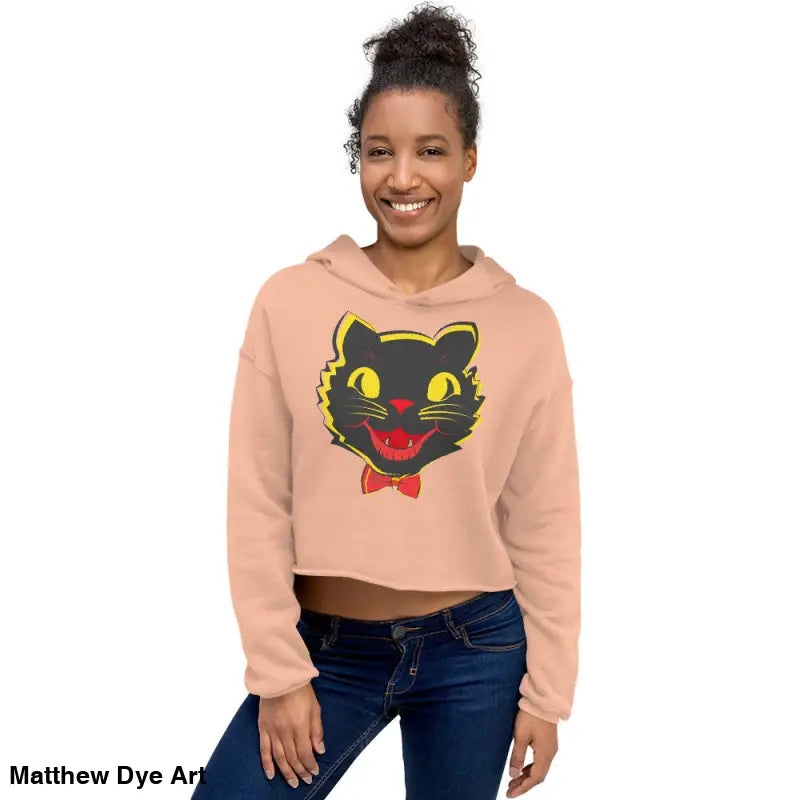 Woman modeling a stylish vintage black cat crop hoodie for Halloween