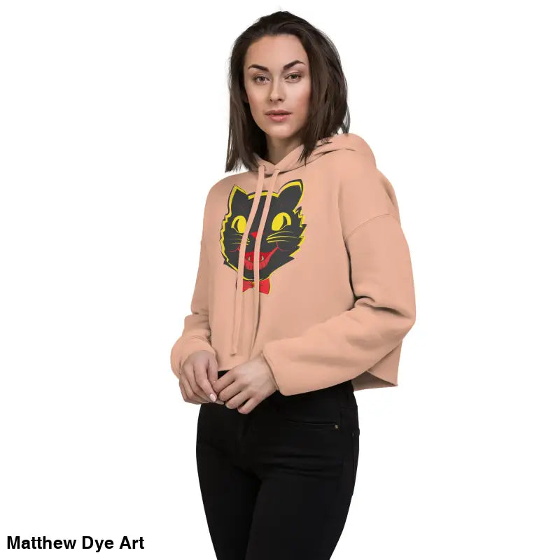 Peach-colored cat crop hoodie featuring a vintage black cat graphic for stylish autumn wear
