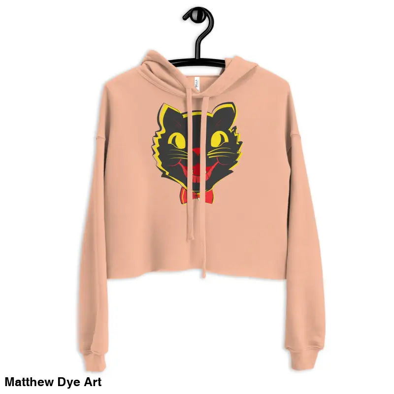 Peach cropped hoodie featuring a vintage black cat graphic for stylish Halloween fashion