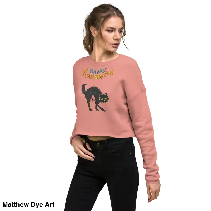 Woman’s cropped Halloween sweatshirt featuring a scary cat design in enchanting mint green