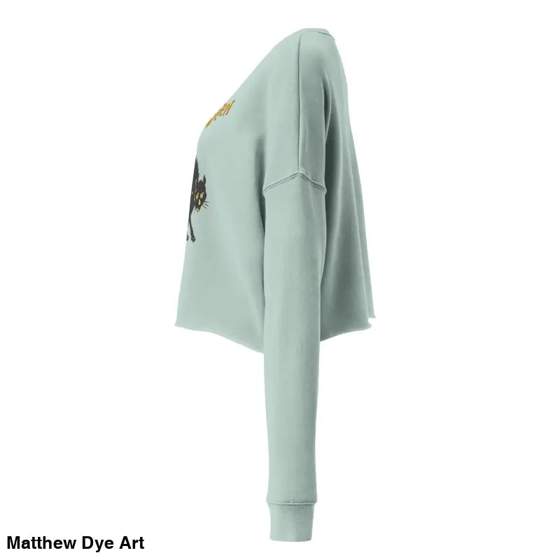 Light green cropped sweatshirt featuring a scary cat Halloween graphic design
