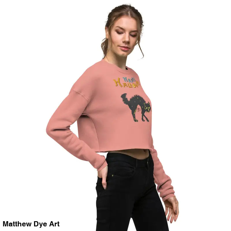 Cropped pink sweatshirt featuring a black cat graphic for a Scary Cat Halloween look