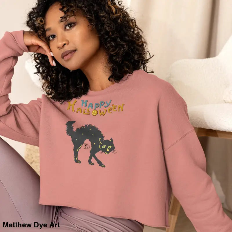 Pink Halloween sweatshirt featuring a scary cat design from the Witchy & Wild collection