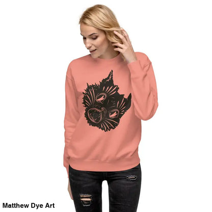 Salmon-colored premium spooky sweatshirt with a black graphic featuring a kitty head unisex
