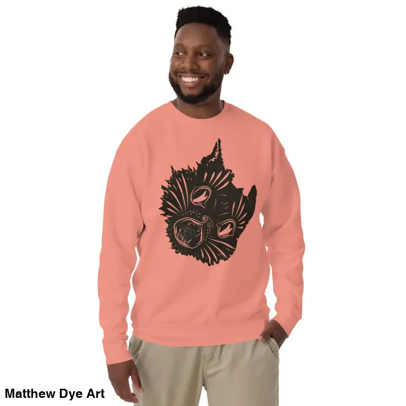 Salmon-colored premium spooky sweatshirt featuring a black cat design and soft fleece interior