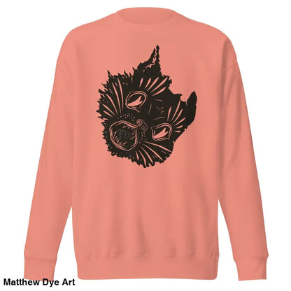 Salmon-colored premium spooky sweatshirt featuring a black cat design on a soft fleece interior