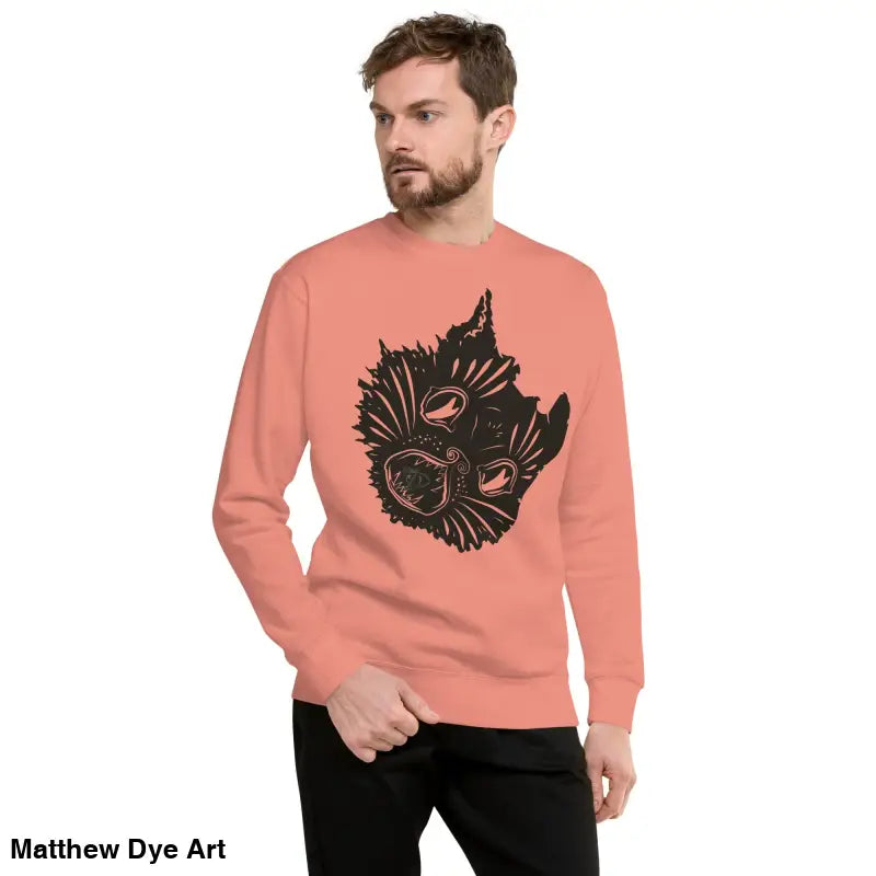 Salmon-colored premium spooky sweatshirt featuring a black cat graphic for unisex wear