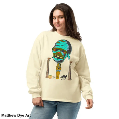 Cream-colored premium long sleeve sweatshirt featuring mummy mystique graphic design