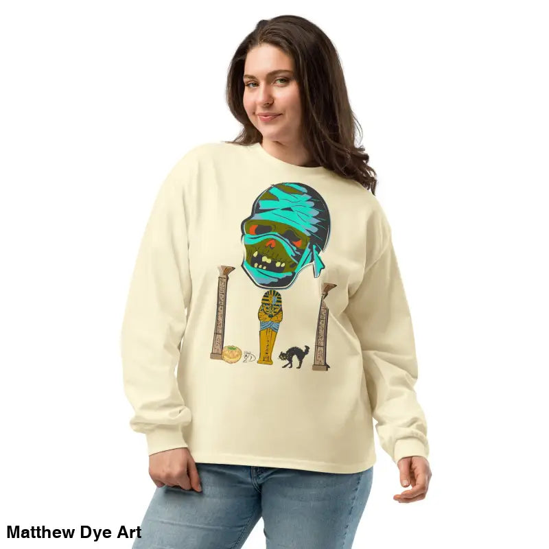 Cream-colored premium long sleeve sweatshirt featuring mummy mystique graphic design