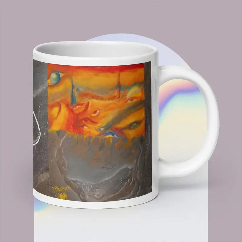 White ceramic mug with abstract orange and gray design by Matthew Dye, art-inspired