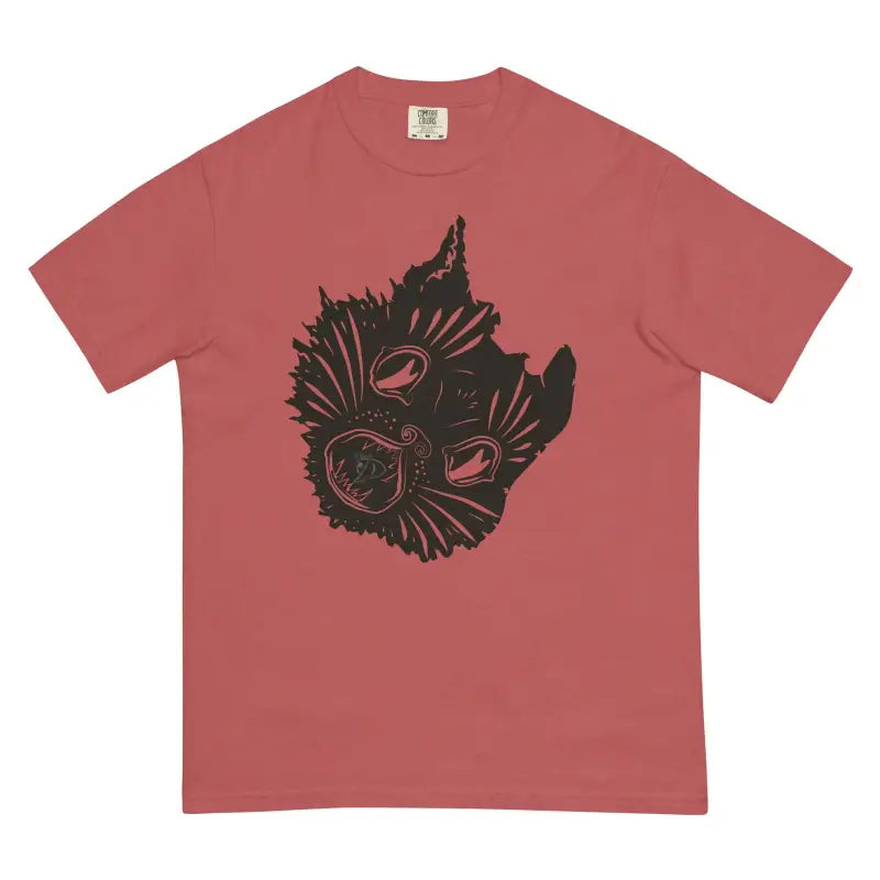 Salmon-colored feline heavyweight tee featuring a black cat face design on front