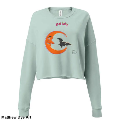 Light blue crop sweatshirt featuring moon and bat graphic for stylish fall fashion