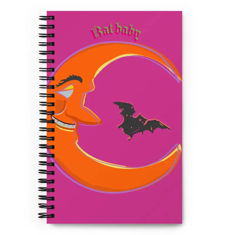 Spiral notebook featuring a smiling crescent moon and bat design for Halloween celebrations