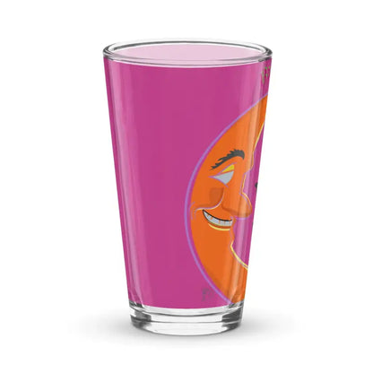 Clear Bat Baby Pint Glass filled with pink liquid and orange circular design for Halloween