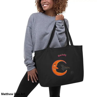 Black tote bag with moon and bat design, perfect for Halloween and retro aesthetics