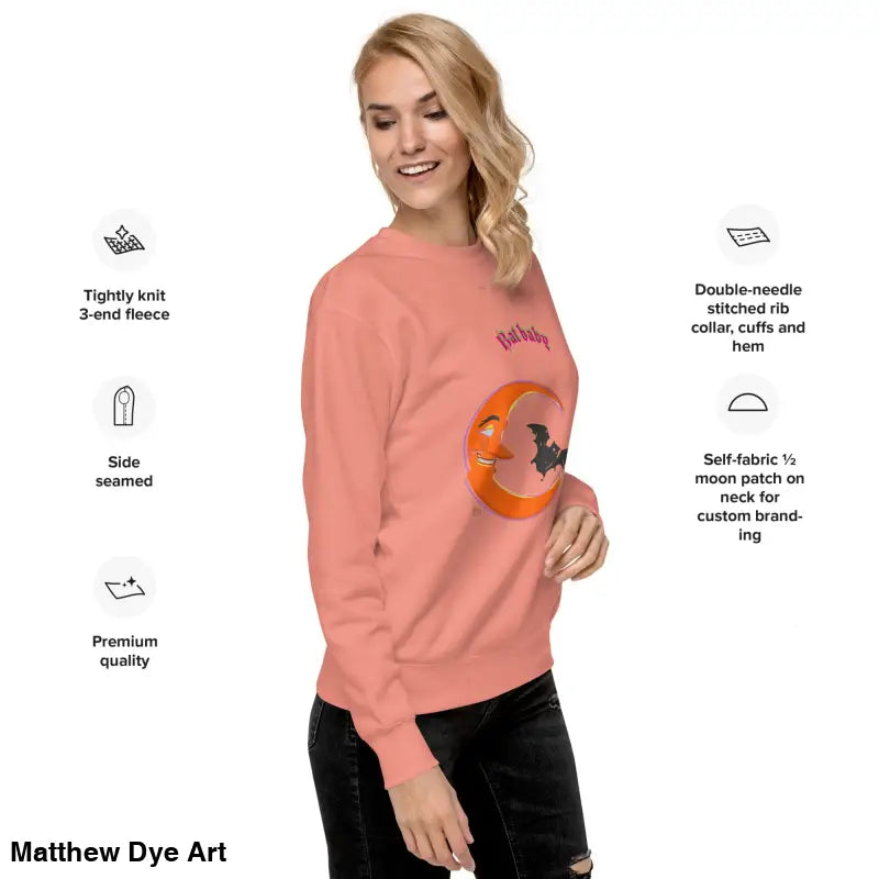 Peach-colored unisex sweatshirt featuring a crescent moon and bat design for Halloween