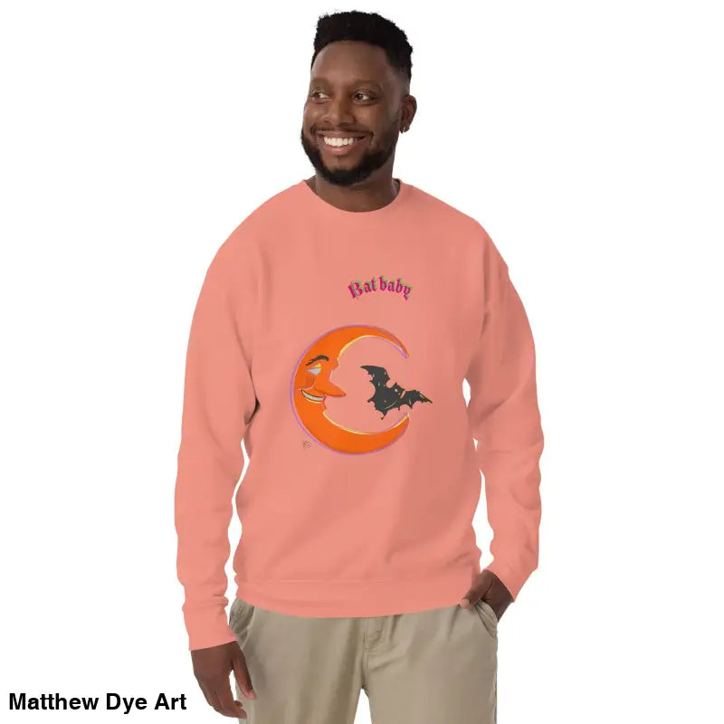 Peach-colored unisex Bat Baby sweatshirt featuring a moon and bat graphic for Halloween