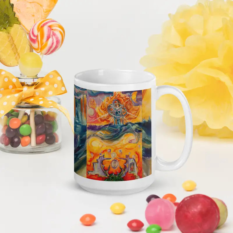 White glossy mug with colorful spiritual artwork in vibrant orange and blue tones