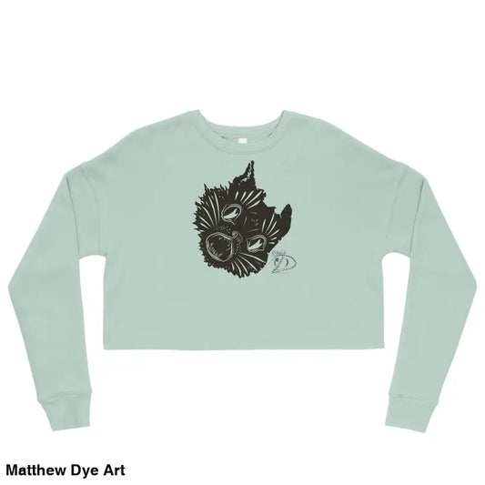 Mint green cropped sweatshirt featuring a black wolf head design for spooky season style