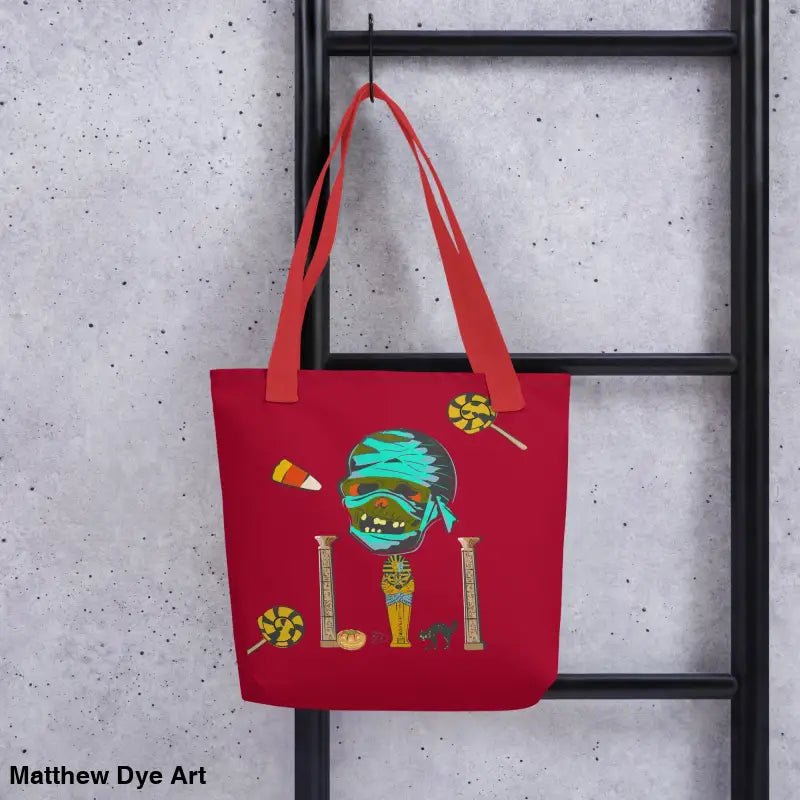 Red Halloween-themed reusable trick-or-treat tote bag named CURSE OF THE PHARAOH
