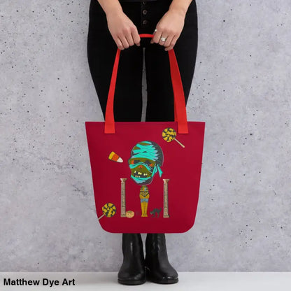 Red Halloween-themed CURSE OF THE PHARAOH reusable trick or treat tote bag featuring a mummy design