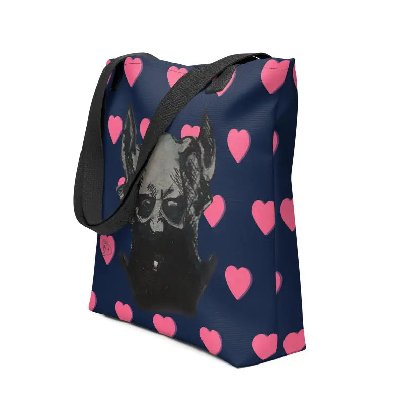 Navy blue tote bag featuring a sinister demonic figure decorated with pink hearts