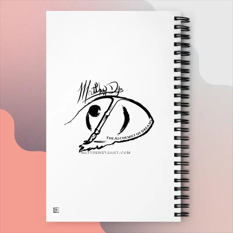 Spiral notebook featuring a black artistic logo design from Above the Shadows Art