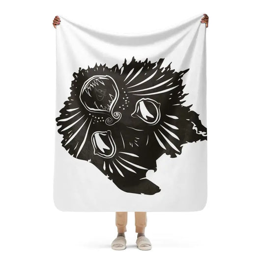 Artistic black and white owl illustration on a white fabric banner for an exquisite sherpa blanket