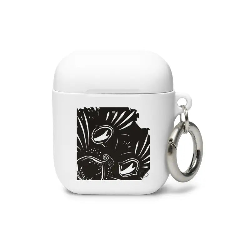 White AirPods case with black artistic design and keyring, featuring kitty head rubber style