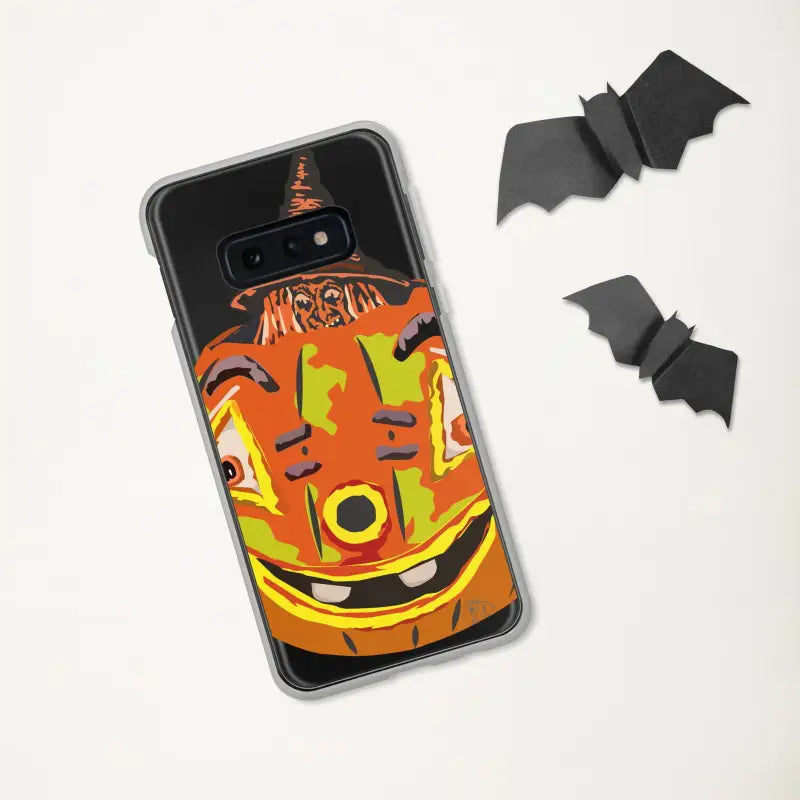 Smiling Halloween pumpkin design with bats on Enchanting Pumpkin Witch Clear Case for Samsung Galaxy