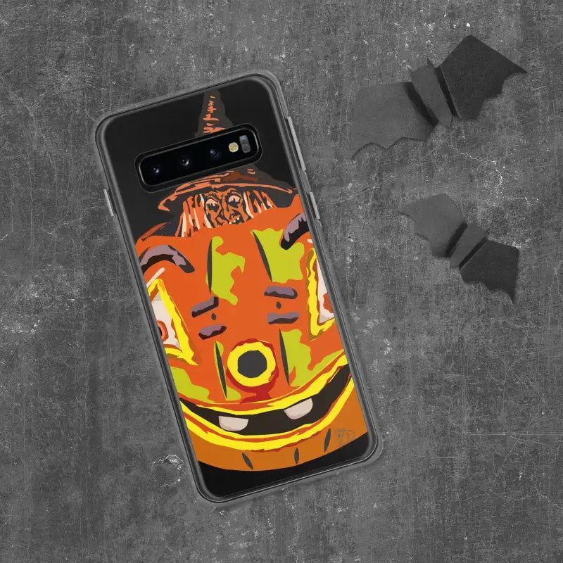 Samsung phone in Enchanting Pumpkin Witch Clear Case featuring a vibrant pumpkin face design