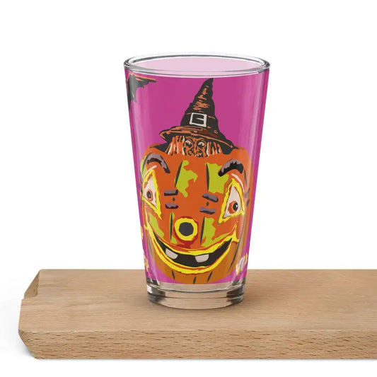 Clear shaker pint glass featuring a Halloween jack-o’-lantern design in orange and pink