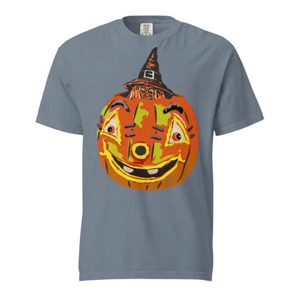 Smiling cute Halloween pumpkin witch on a grey t-shirt for a spooky look