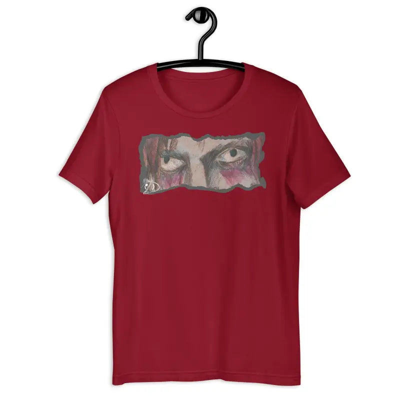 Red T-shirt featuring haunting eyes graphic for Halloween spirit and eerie elegance