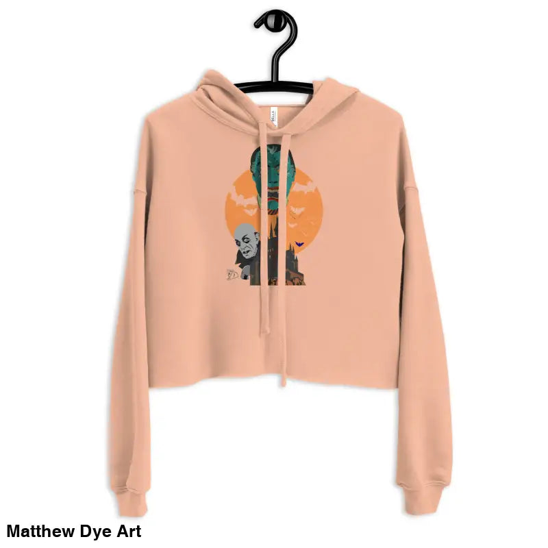 Peach-colored cropped hoodie from Fangs & Fashion, meticulously crafted for vampire enthusiasts
