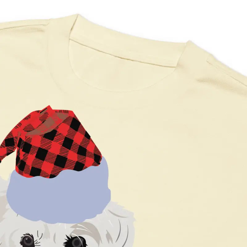 Cream-colored long sleeve shirt featuring dog in plaid Santa hat, ideal gift for art lovers