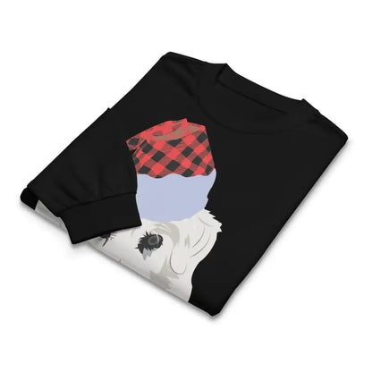 Folded black long sleeve shirt featuring a dog graphic, perfect holiday gift art