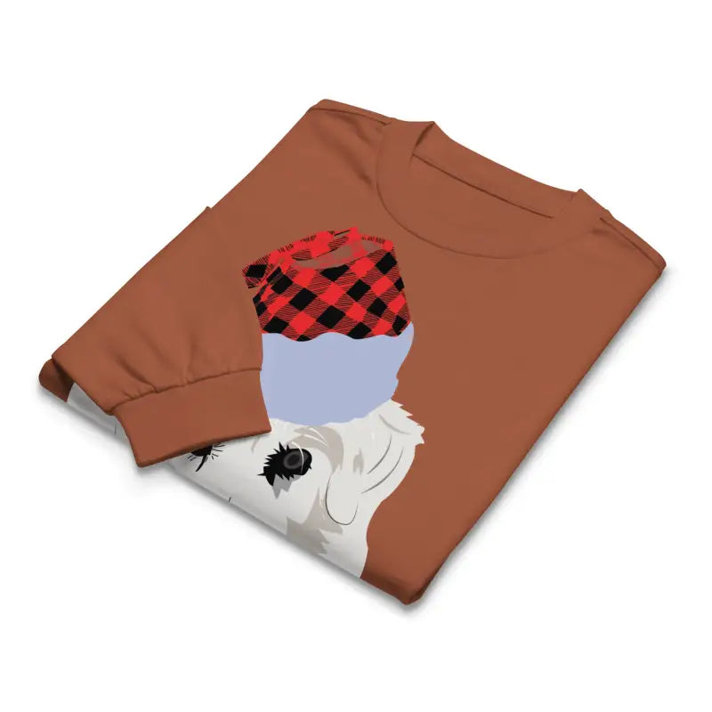 Folded brown long sleeve shirt featuring dog graphic, a perfect gift for art lovers