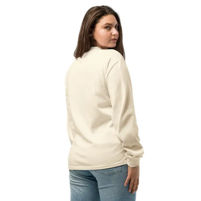 Woman wearing a beige long sleeve shirt from Fluff Yeah! - a perfect holiday gift