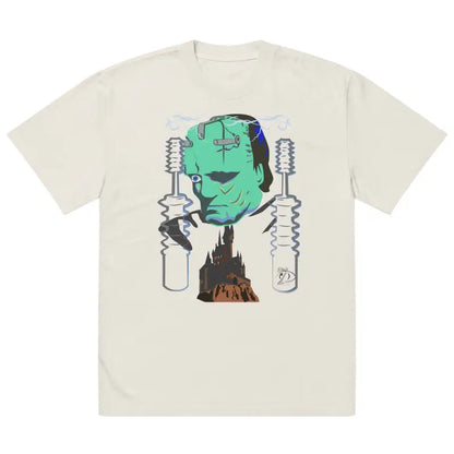 Cream-colored t-shirt with green Frankenstein graphic, Matthew Dye art on display