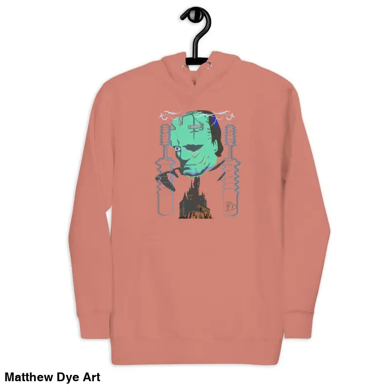 Salmon-colored hoodie featuring a Frankenstein graphic, a delightful tribute to timeless lore
